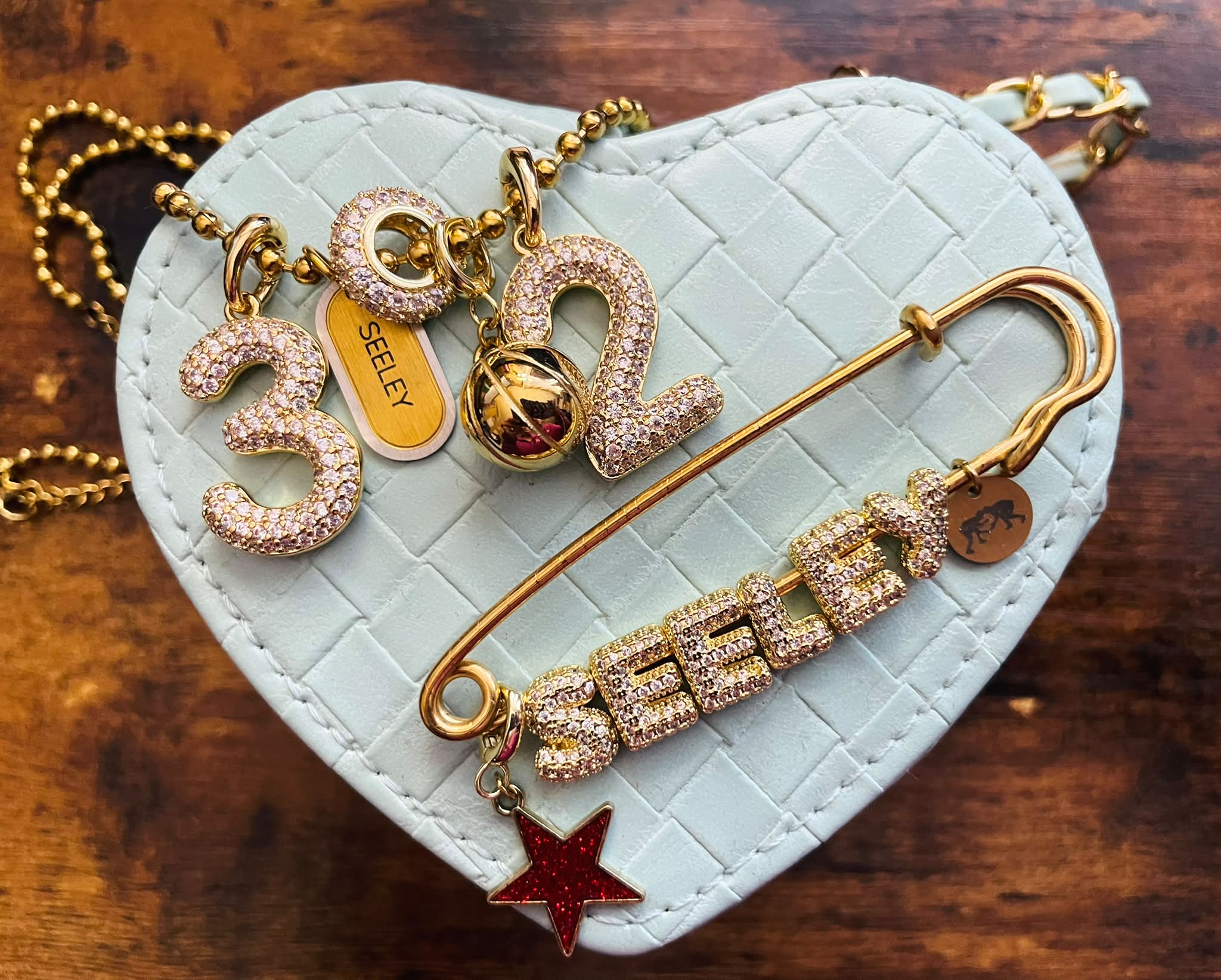 It’s supposed to be 70 degrees today, but my jewelry is ready for winter sports. 

❤️🩶🏀🤼🏽
